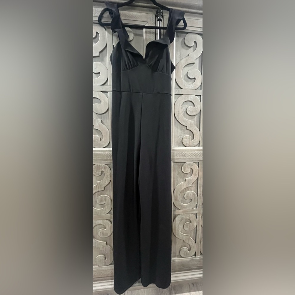 Woman’s black Pant jumpsuit/romper size Medium